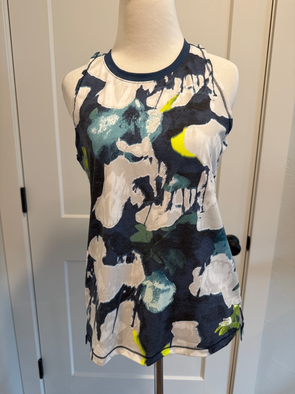The North Face Women’s Navy Floral Racerback Tank with White and Neon Accents
